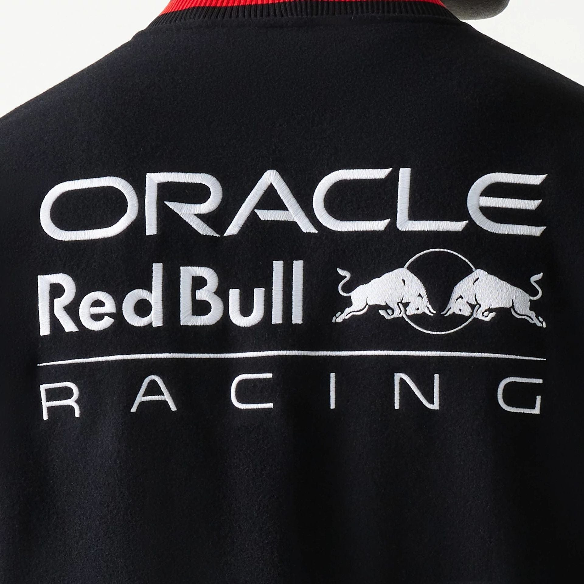 The model is wearing this Red Bull Racing Varsity Jacket in black. 6