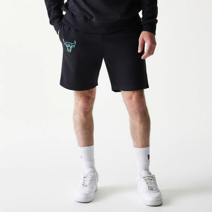 The model is wearing this NBA League Essential Chicago Bulls Shorts in black. 1