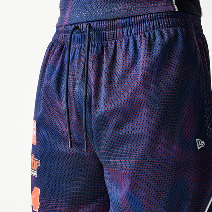 The model is wearing this Red Bull Racing Oversized Mesh Shorts in dark blue. 4
