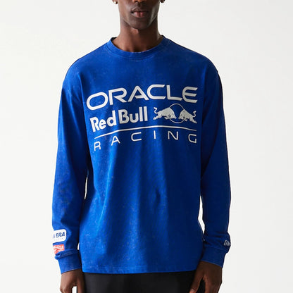 The model is wearing this Red Bull Racing Linear Graphic Long Sleeve T-Shirt in blue. 3