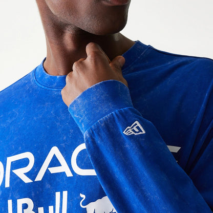 The model is wearing this Red Bull Racing Linear Graphic Long Sleeve T-Shirt in blue. 7