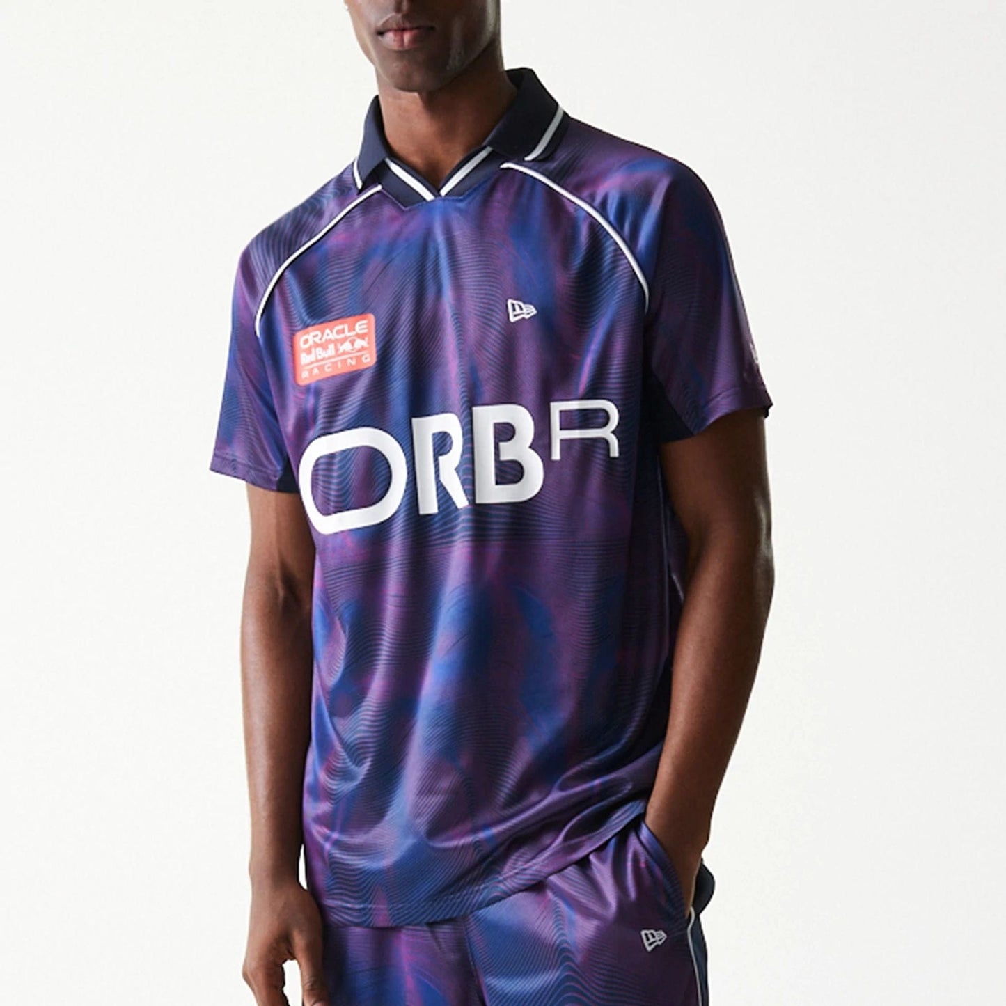 The model is wearing this Red Bull Racing All Over Print Football T-Shirt in dark blue. 4