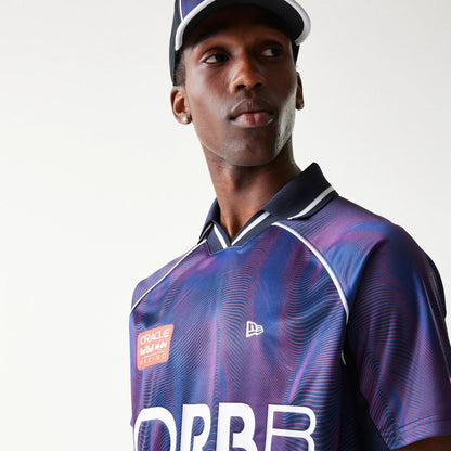 The model is wearing this Red Bull Racing All Over Print Football T-Shirt in dark blue. 5