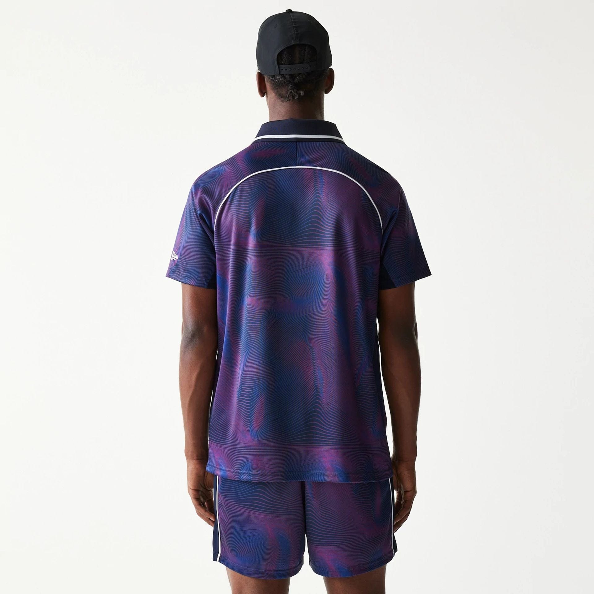 The model is wearing this Red Bull Racing All Over Print Football T-Shirt in dark blue. 2