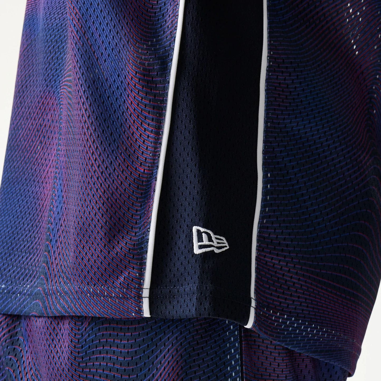 The model is wearing this Red Bull Racing Mesh Tank Top in dark blue. 5