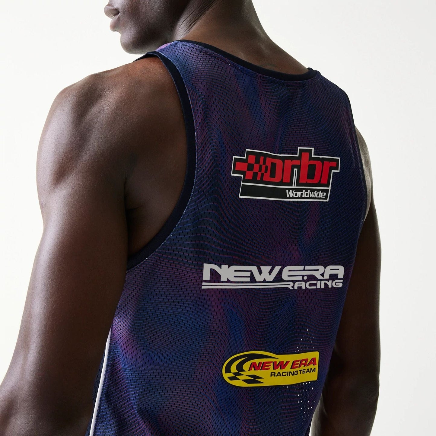 The model is wearing this Red Bull Racing Mesh Tank Top in dark blue. 6