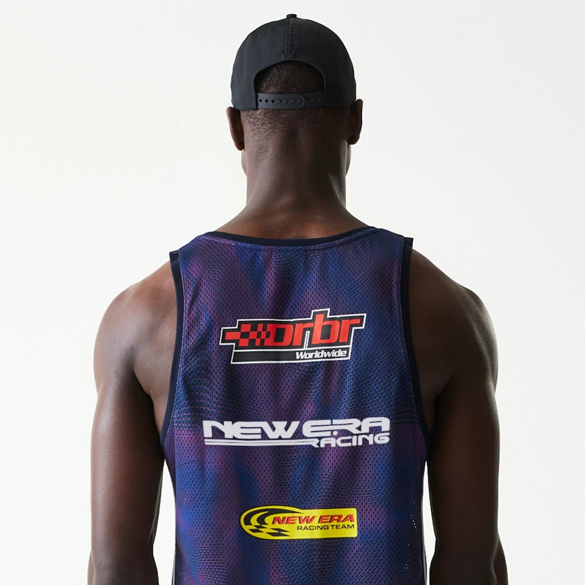 The model is wearing this Red Bull Racing Mesh Tank Top in dark blue. 7