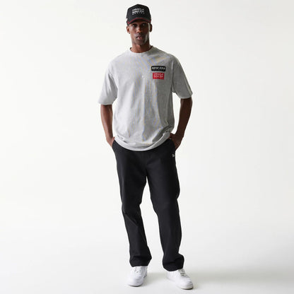 The model is wearing this Red Bull Racing Linear Graphic Oversized T-Shirt in grey. 8