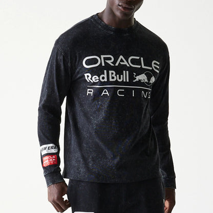 The model is wearing this Red Bull Racing Linear Graphic Long Sleeve T-Shirt in black. 3