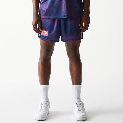 The model is wearing this Red Bull Racing All Over Print Football Shorts in dark blue. 7
