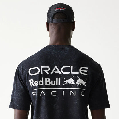 The model is wearing this Red Bull Racing Linear Graphic Oversized T-Shirt in black. 7