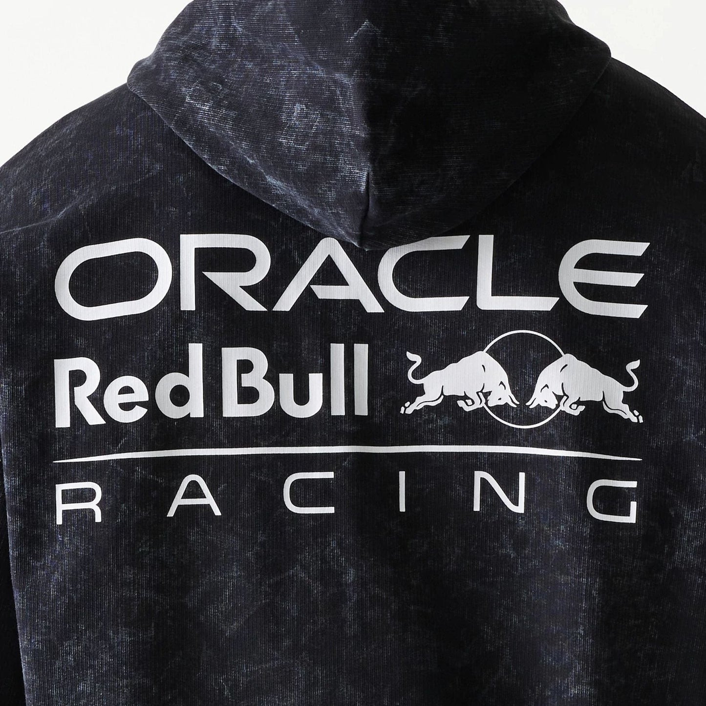 The model is wearing this Red Bull Racing Dropped Shoulder Full Zip Hoodie in black. 6