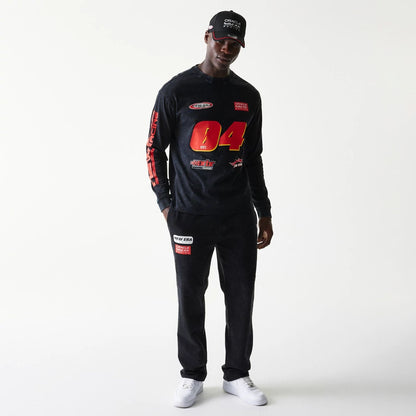 The model is wearing this Red Bull Racing Graphic Long Sleeve T-Shirt in black. 8