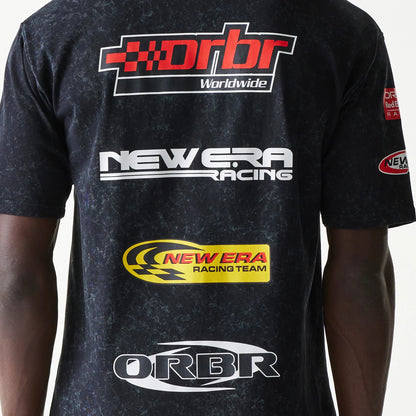 The model is wearing this Red Bull Racing Graphic Oversized T-Shirt in black. 7