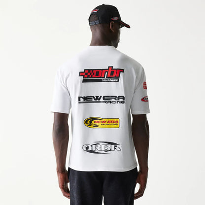 The model is wearing this Red Bull Racing Graphic Oversized T-Shirt in white. 2