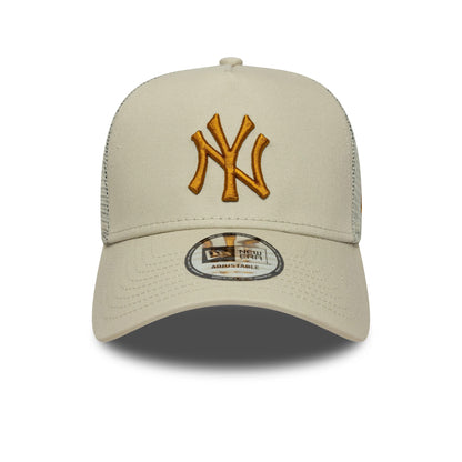 New York Yankees MLB Light Beige New Era 9FORTY A-Frame Trucker Cap, front view showing the gold embroidered NY logo on the front panel with a curved visor and 9FORTY size sticker, featuring mesh rear panels.