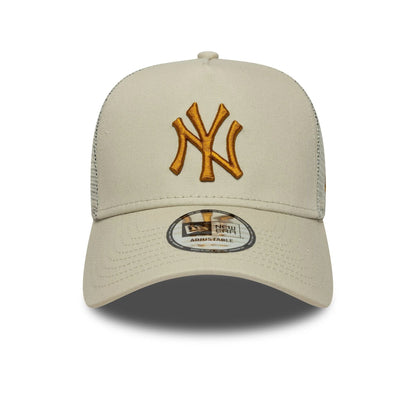 Pictured is this MLB League Essential New York Yankees 9FORTY A-Frame Trucker in light beige. 2