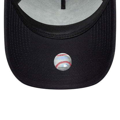 New York Yankees MLB Outline Navy New Era 9FORTY E-Frame Trucker Cap, inside view showing the grey undervisor with twill taping along the seams and a reflective MLB sticker on the navy curved visor.