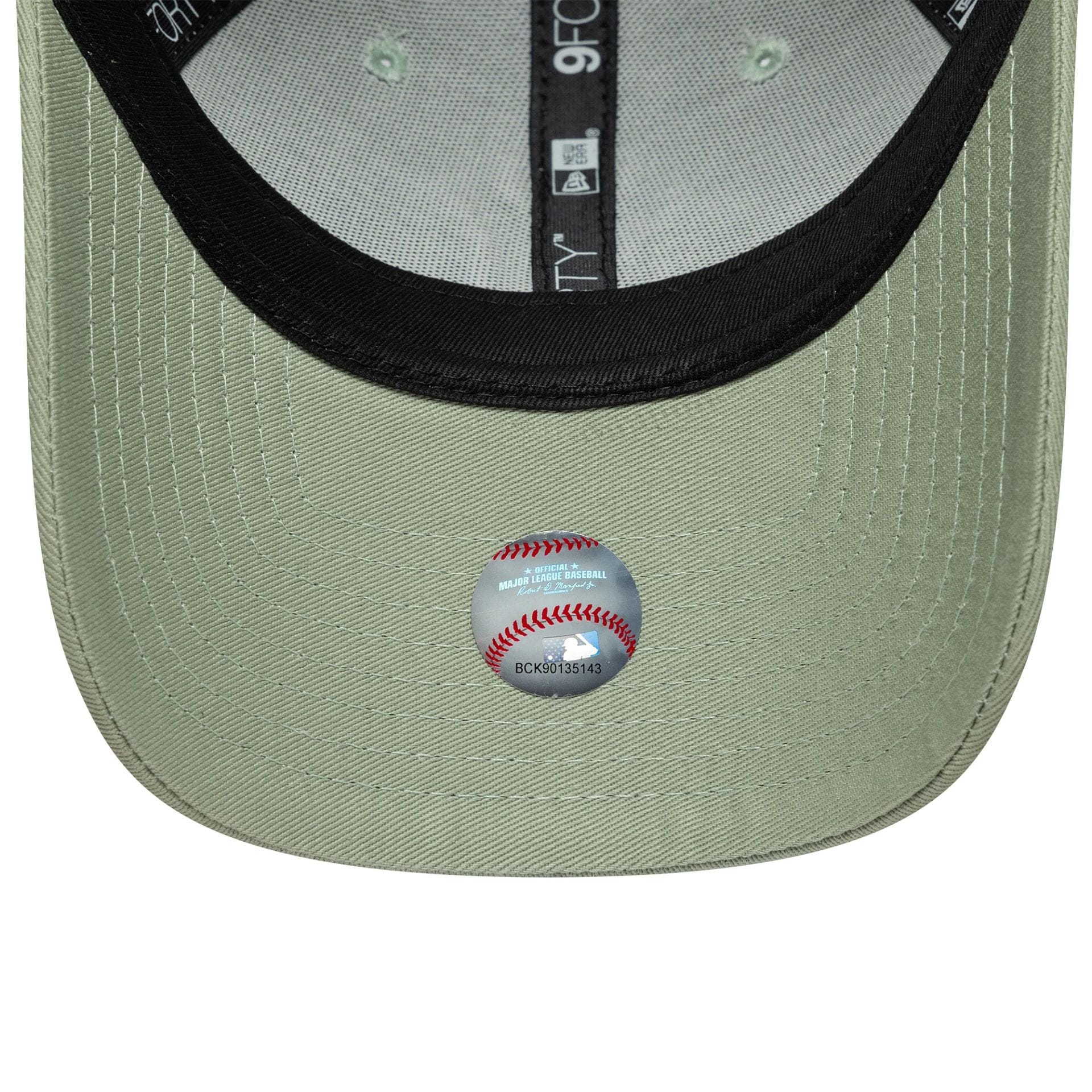Pictured is this Womens MLB League Essential New York Yankees 9FORTY in pastel green. 5