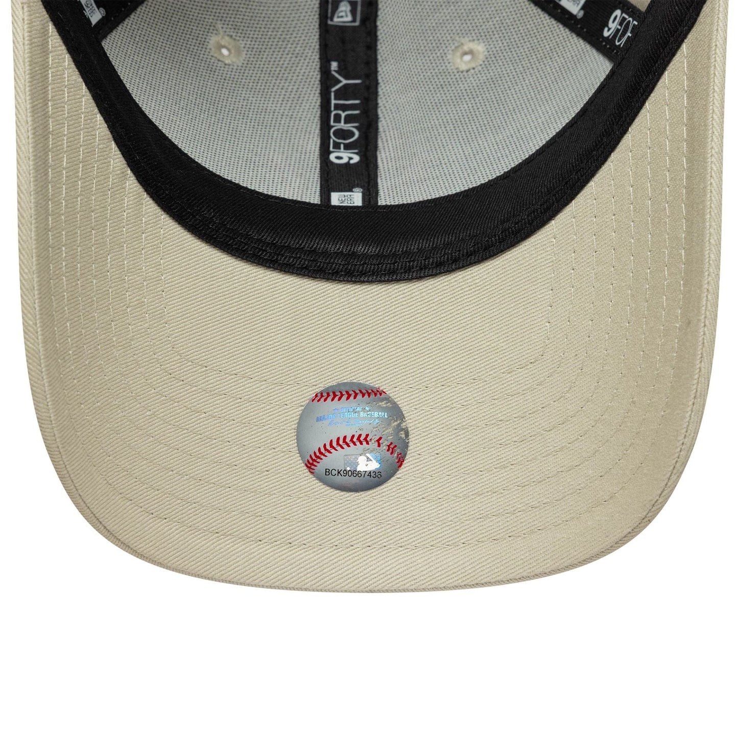 Pictured is this Womens MLB League Essential New York Yankees 9FORTY in light beige. 5