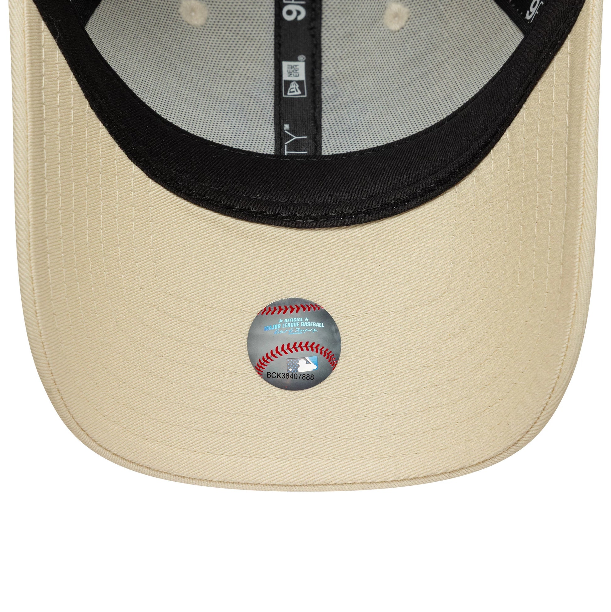 Pictured is this Womens MLB Metallic Logo New York Yankees 9FORTY in light beige. 5