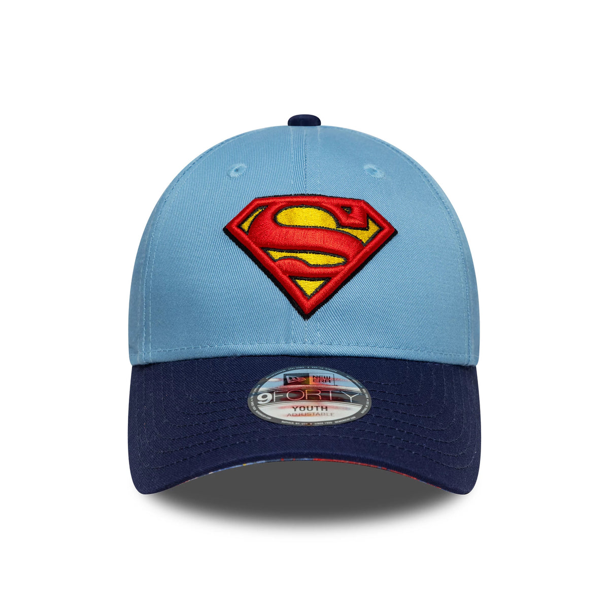 Youth DC Superman Pastel Blue New Era 9FORTY Cap, front view showing the red and yellow Superman logo in raised embroidery on the light blue front panel, with a navy curved visor and a 9FORTY size sticker on the top.