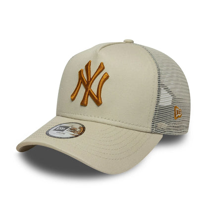 Pictured is this Youth MLB League Essential New York Yankees 9FORTY A-Frame Trucker in light beige. 1
