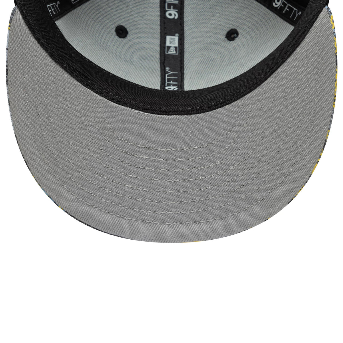 Youth DC Batman Black New Era 9FIFTY Snapback Cap, inside view showing the grey undervisor, black sweatband with repeated 9FIFTY labels, and two black eyelets on the structured interior crown.