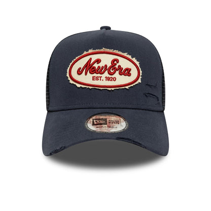 Pictured is this New Era Canvas Distressed 9FORTY A-Frame Trucker in navy. 2