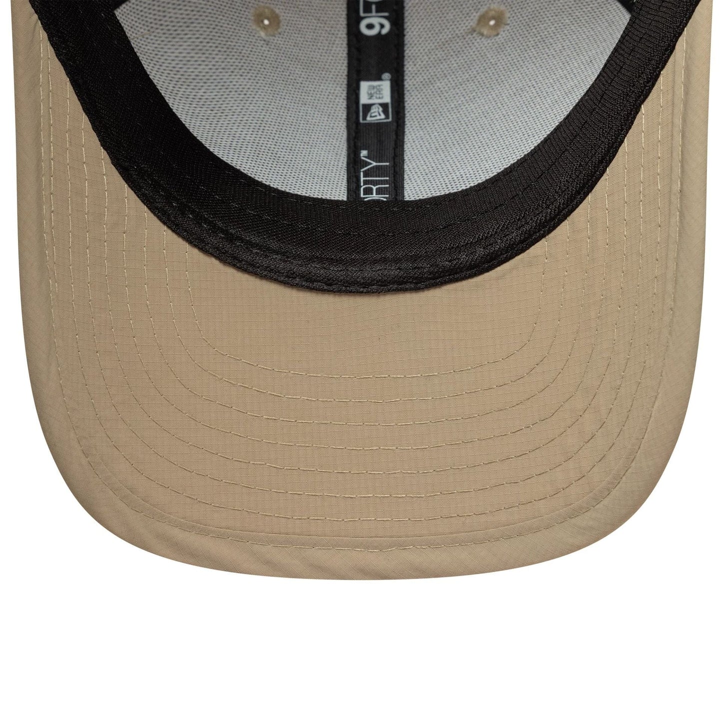Pictured is this New Era Sport 9FORTY M-Crown in light beige. 5