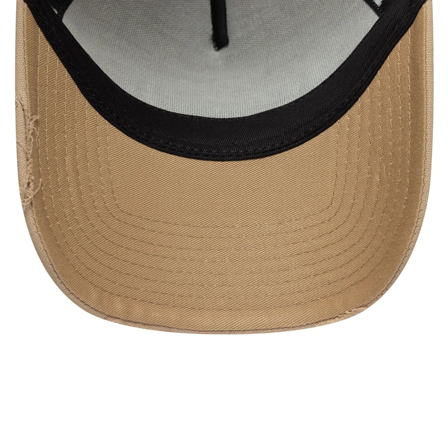 Pictured is this New Era Canvas Distressed 9FORTY A-Frame Trucker in light beige. 5