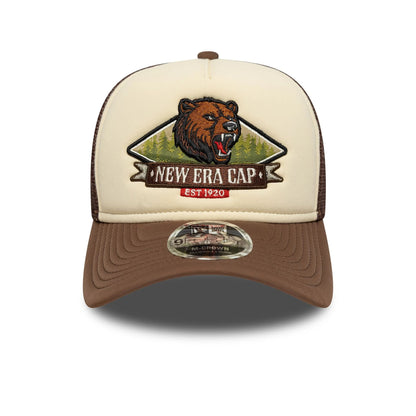 Pictured is this New Era Graphic 9FORTY M-Crown A-Frame Trucker in light beige. 2