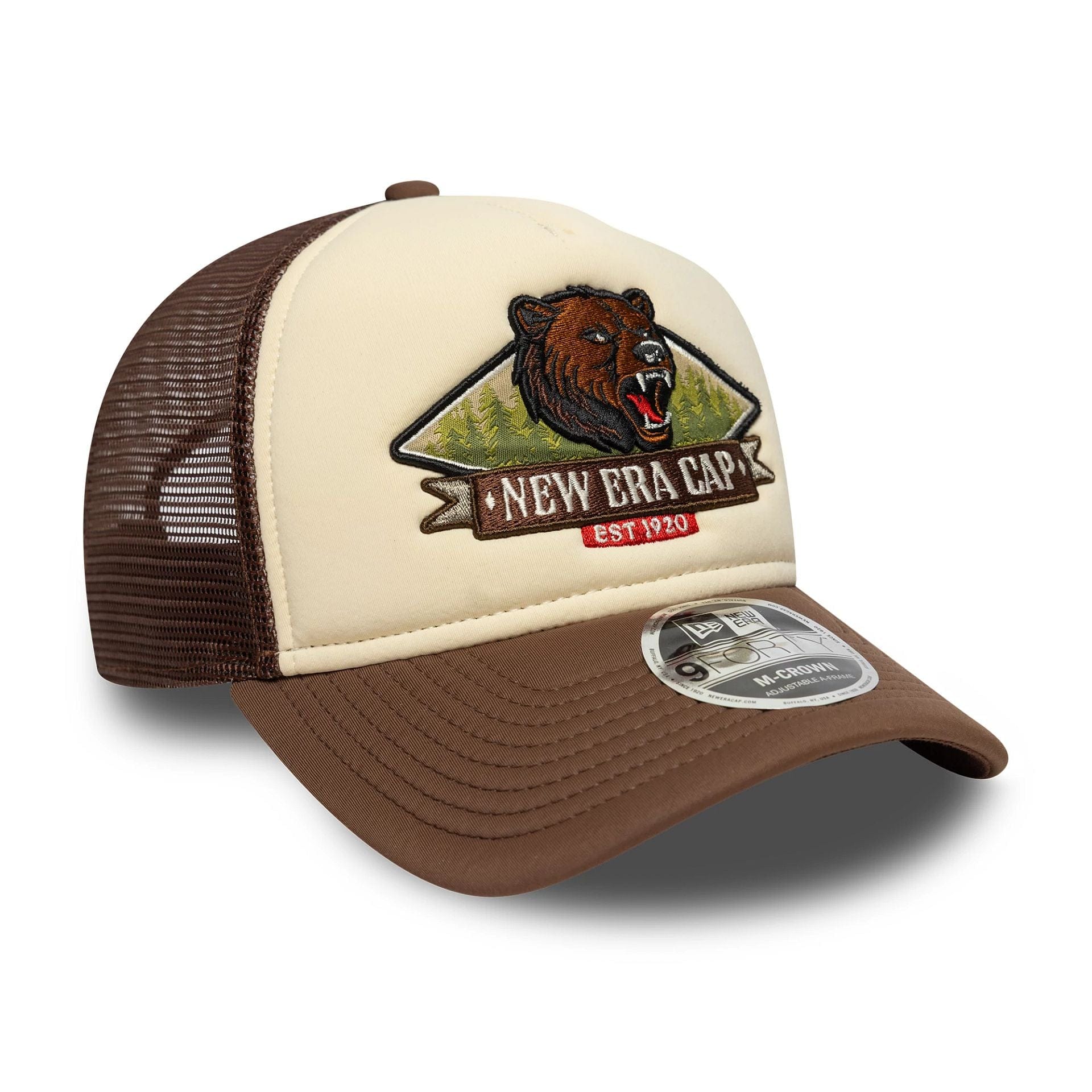 Pictured is this New Era Graphic 9FORTY M-Crown A-Frame Trucker in light beige. 3