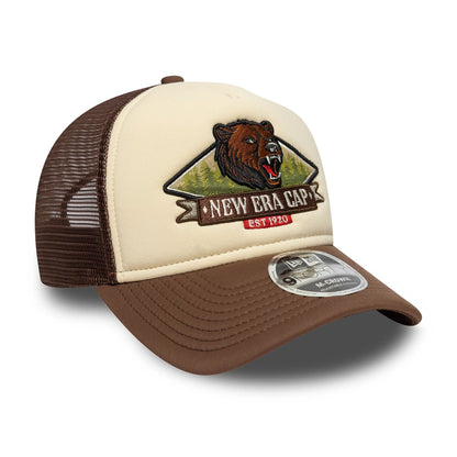 Pictured is this New Era Graphic 9FORTY M-Crown A-Frame Trucker in light beige. 3