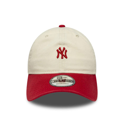 New York Yankees MLB Mini Logo Red New Era 9TWENTY Cap, front view showing the red embroidered NY logo on a cream crown, red curved visor with a 9TWENTY size sticker, and matching red top button.