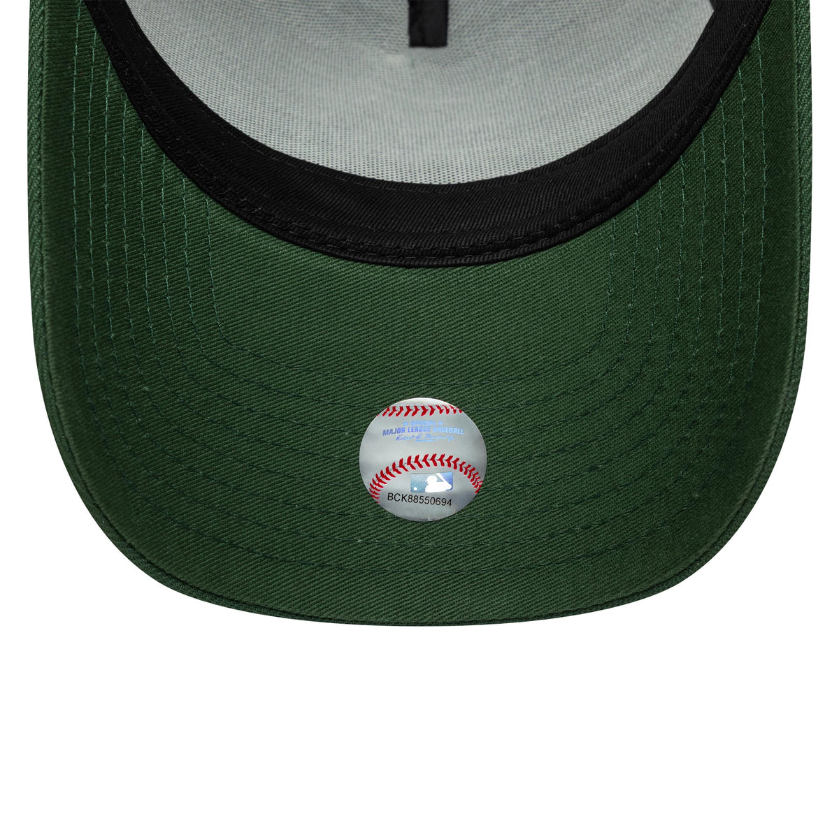 New York Yankees MLB Outline Script Dark Green New Era 9FORTY E-Frame Cap, inside view showing a grey undervisor with a detachable sticker featuring a baseball design, black sweatband and grey internal taping.