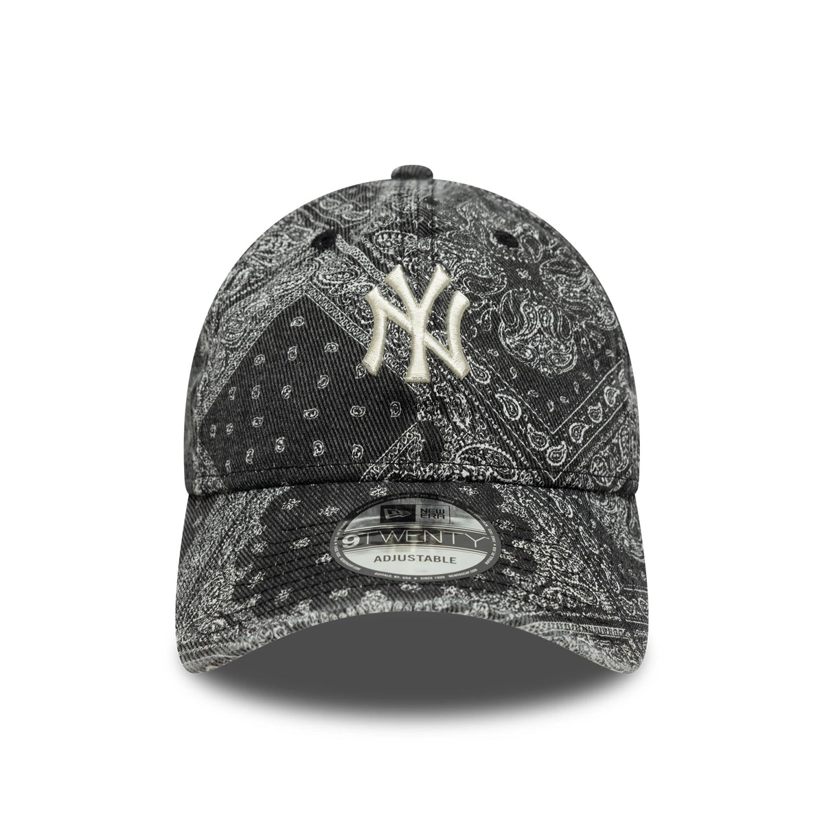 New York Yankees MLB Washed Paisley Black New Era 9TWENTY Cap, front view showing a raised white embroidered NY logo on the intricately patterned black paisley crown, with a 9TWENTY size sticker on the curved visor.