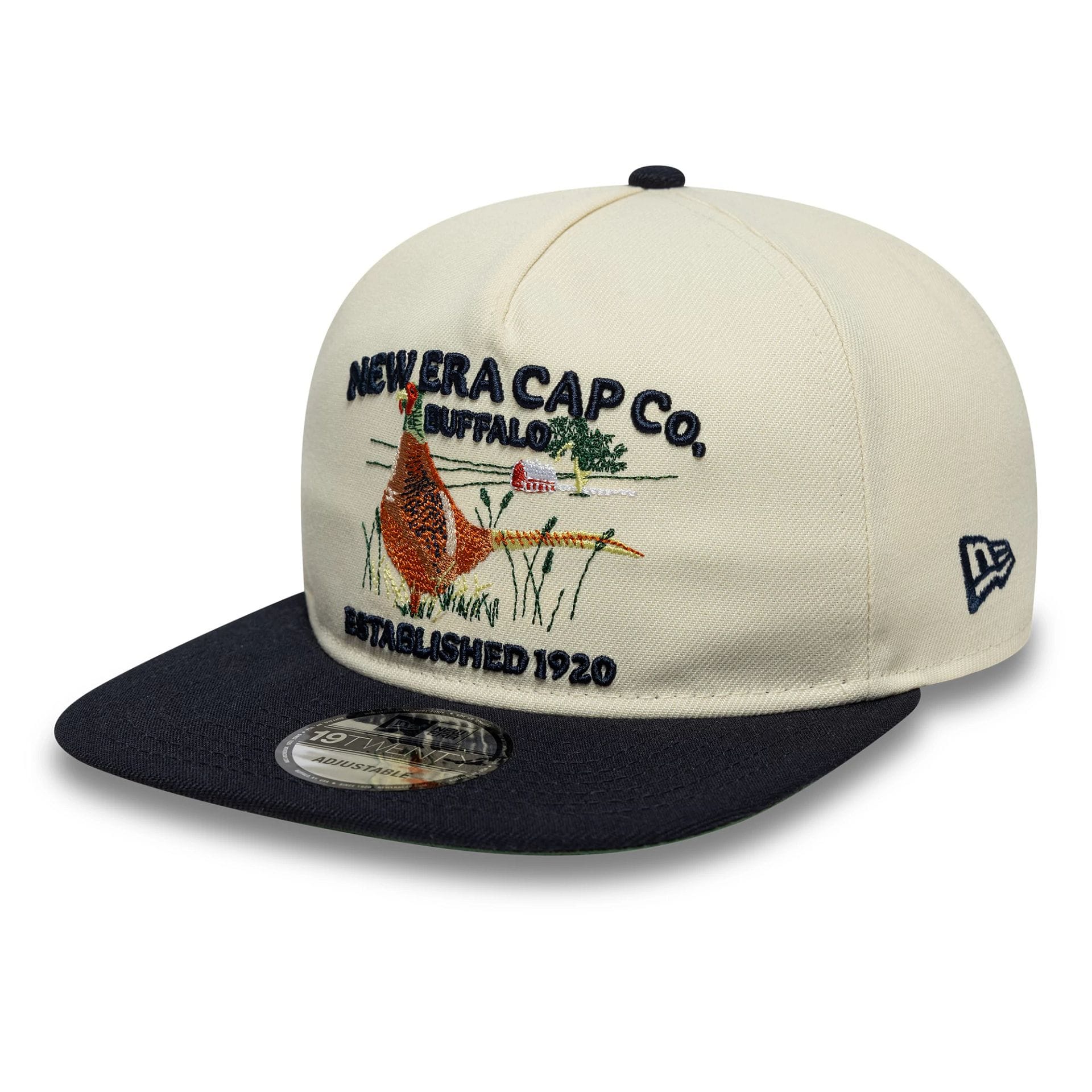 Pictured is this New Era Outdoor Graphic 19TWENTY cap in light beige. 1