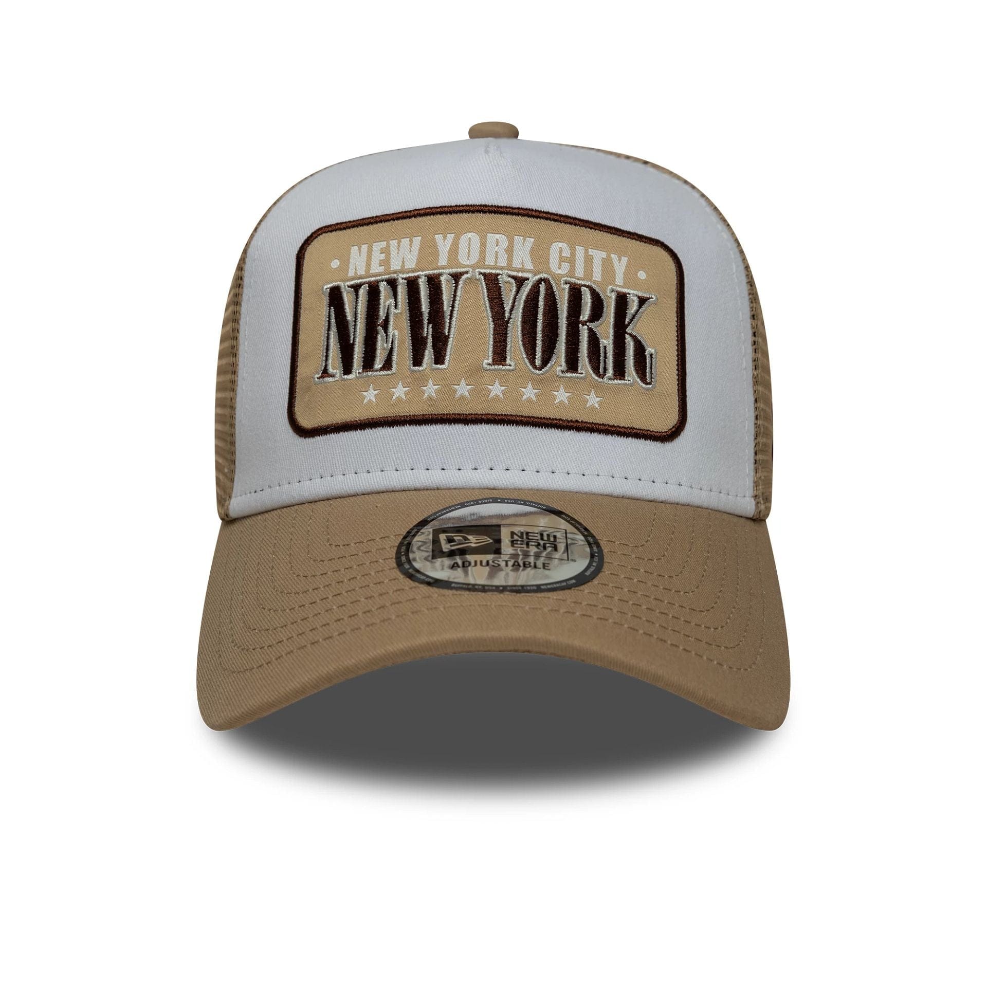 Pictured is this New Era Location Patch 9FORTY A-Frame Trucker in light beige. 2