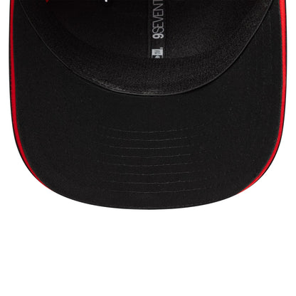 Ducati Motor Logo Print Black New Era 9SEVENTY Stretch Snap Cap, inside view showing the black segmented undervisor, red accent along the edge, black sweatband, and the New Era taping along the seam.