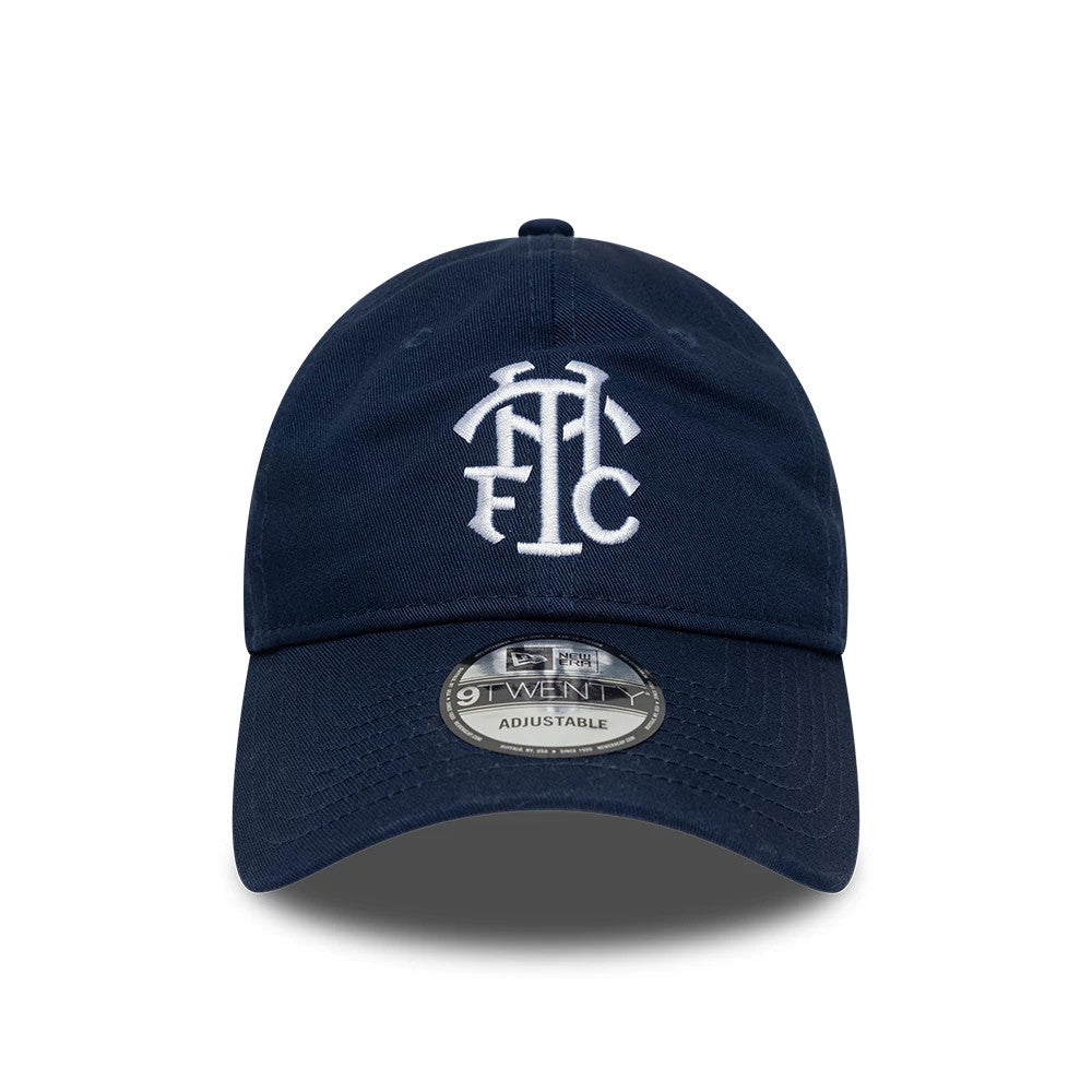 Tottenham Hotspur FC Monogram Navy New Era 9TWENTY Adjustable Cap, front view showing the white embroidered THFC monogram logo on the structured navy crown, with a 9TWENTY size sticker on the curved visor.