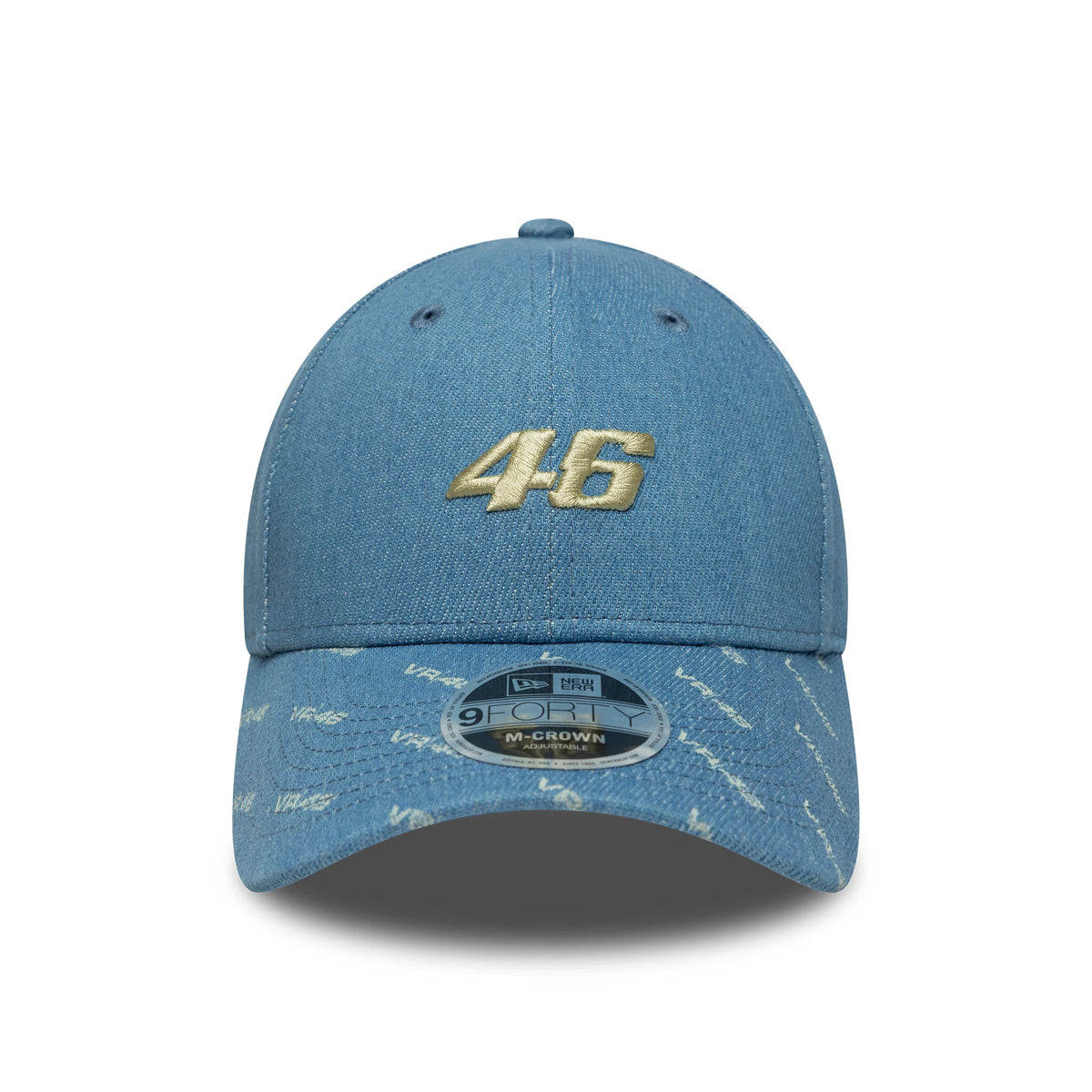 VR46 Denim Open Blue New Era 9FORTY M-Crown Cap, front view showing a gold embroidered 46 on the structured denim crown, with a 9FORTY size sticker on the visor featuring a scripted pattern.