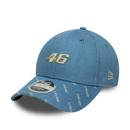 VR46 Denim Open Blue New Era 9FORTY M-Crown Cap, three-quarter view showing the gold embroidered 46 on the front panel, VR46 pattern on the visor, and New Era flag logo on the left side, with a 9FORTY size sticker.