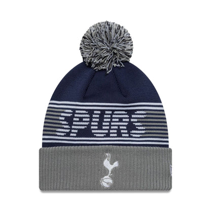 Pictured is this Tottenham Hotspur FC Bobble Knit Beanie in navy. 1