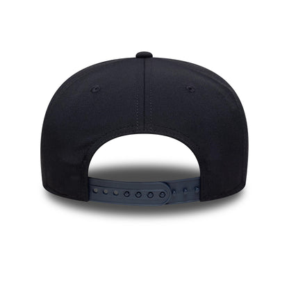 Chelsea FC Lion Crest Iridescent Navy New Era 9SEVENTY Stretch Snap Cap, rear view displaying the adjustable snap closure and the structure of the dark navy crown, with eyelets and a top button adding detail to the design.