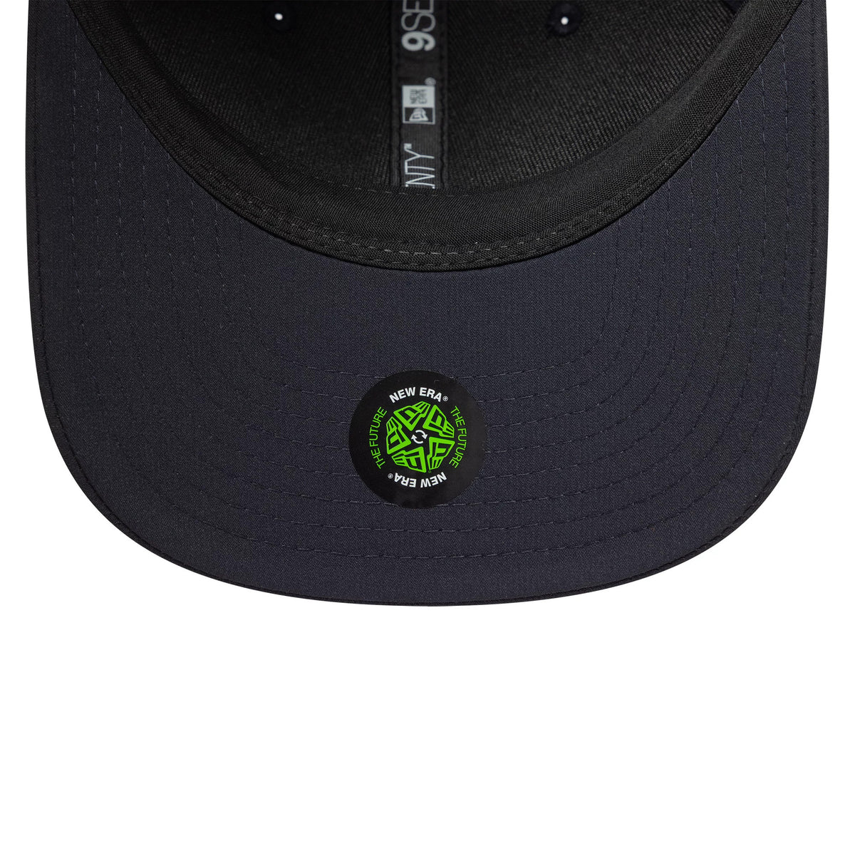 Chelsea FC Lion Crest Iridescent Navy New Era 9SEVENTY Stretch Snap Cap, inside view showing the grey sweatband, branded taping with New Era and 9SEVENTY markings, and a green The Future sticker on the dark undervisor.
