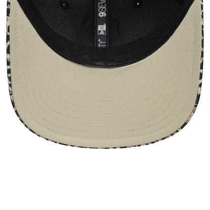 Visa Cash App Racing Bulls Leopard New Era 9SEVENTY Stretch Snap Cap, inside view showing the black taping and sweatband, with a beige undervisor and patterned leopard trim along the edge of the visor.