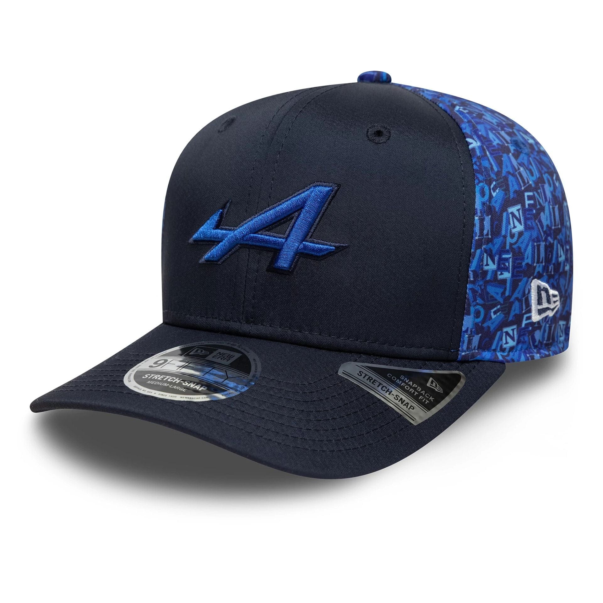 Pictured is this All Over Print Alpine Racing 9FIFTY Stretch Snap in navy. 1