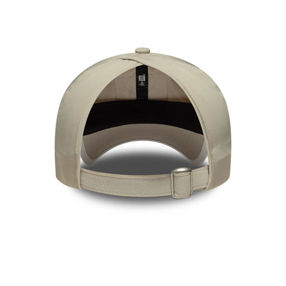 Pictured is this Womens Red Bull Racing Pony Tail in light beige. 2