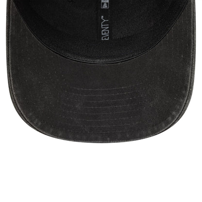 Moto Guzzi Washed Black New Era 9SEVENTY Stretch Snap Cap, inside view showing a black undervisor with detailed stitching, a black sweatband, and taping featuring the New Era logo and 9SEVENTY branding.